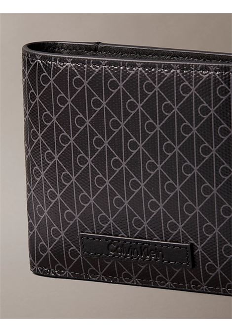 Portafoglio a libro con logo monogramma all-over e pochette portamonete CALVIN KLEIN | LV04D1085GUB1